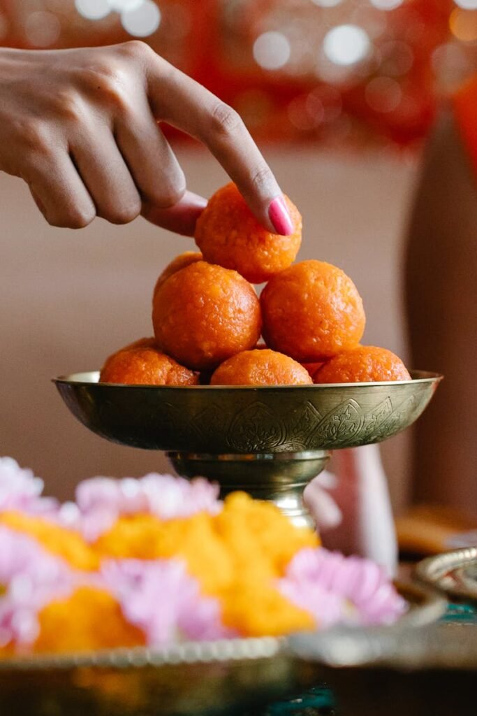 A vibrant display of Indian festive sweets and decorations showcases lively colors and cultural richness.